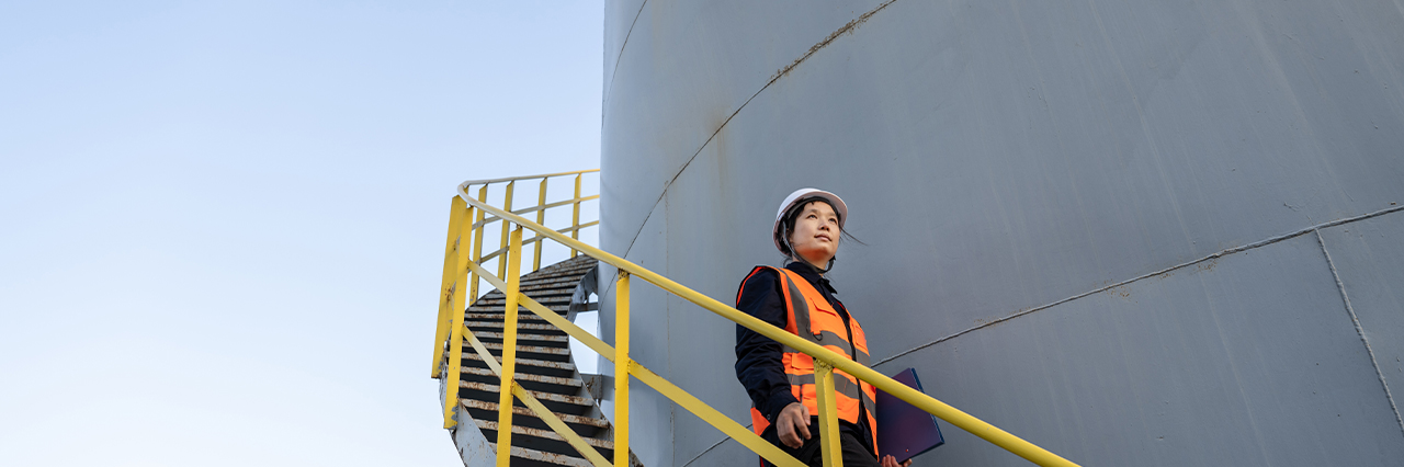 a female worker walking down the outdoor stairs