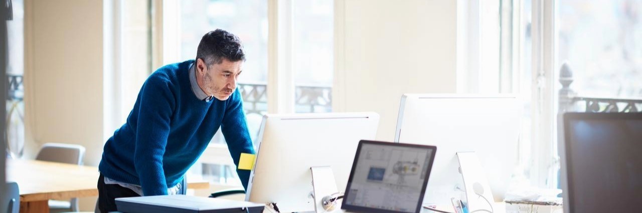 An image of a man thinking on how to determine credit terms of an invoice