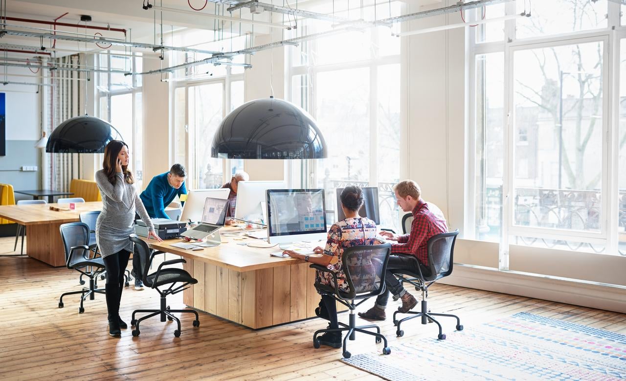 office setting with 4 co-workers