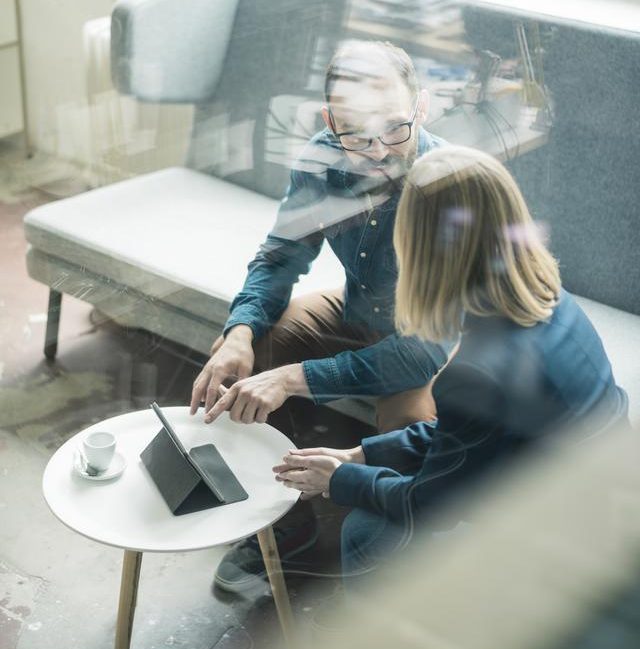 Image: People discussing on a coach