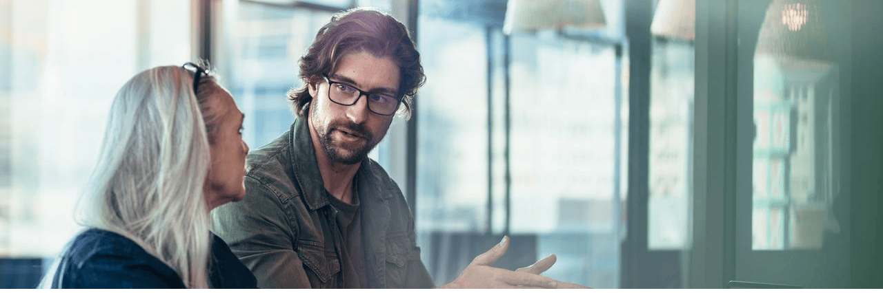 two people working with AI