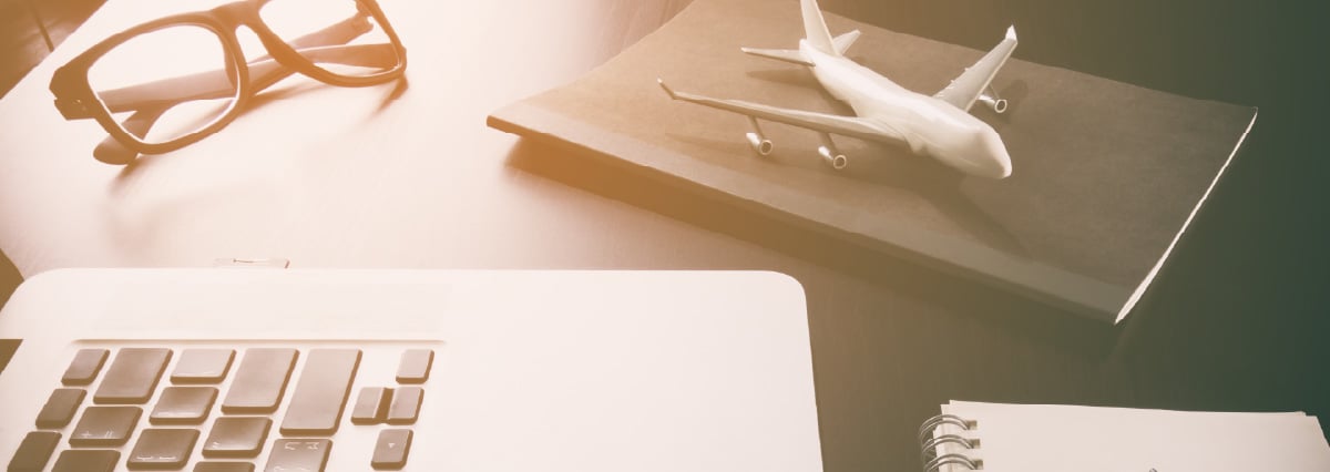 Business travel agency on computer working desk