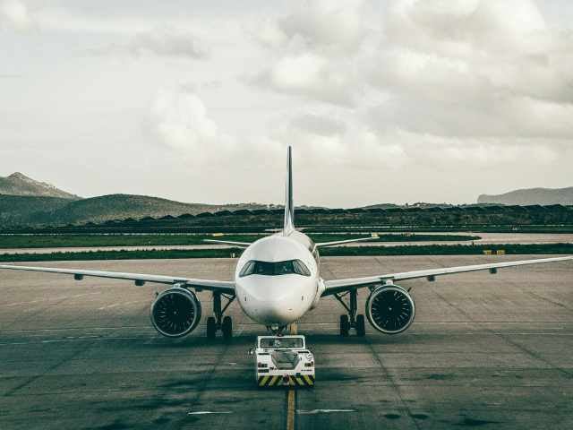 Plane still on airport runway 