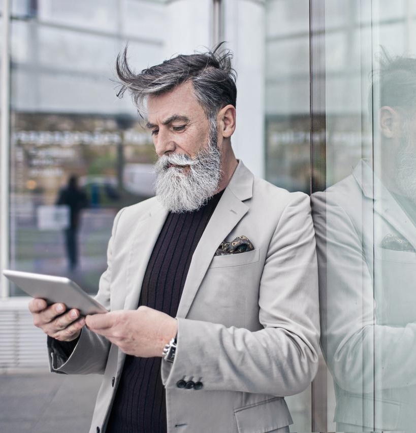An entrepreneur consulting data on a tablet