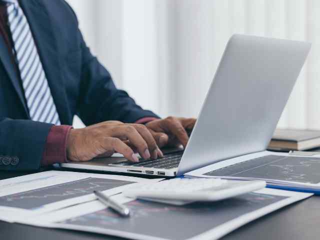 An entrepreneur working on his laptop