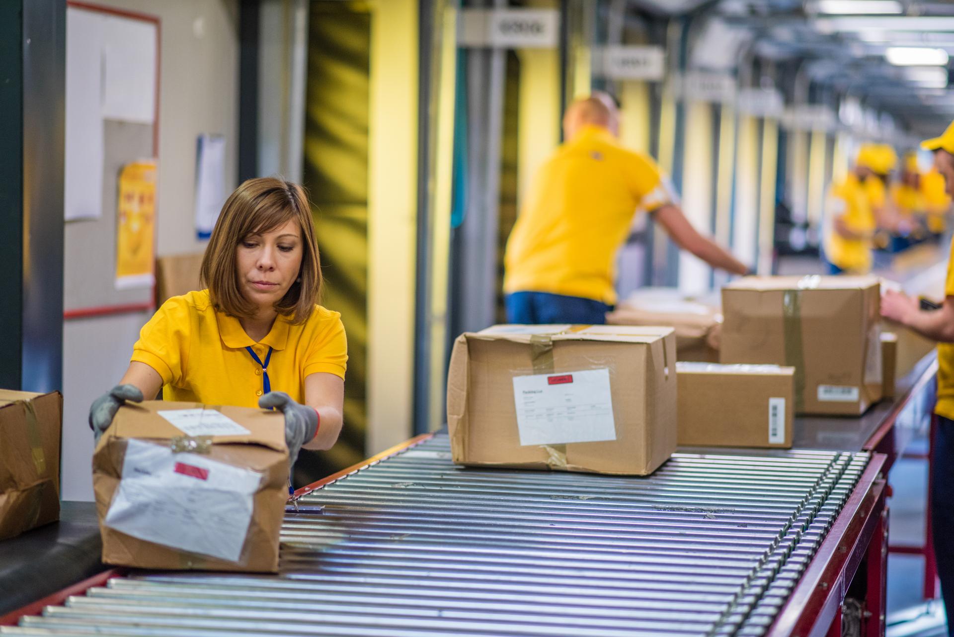 line workers packingpacking parcels