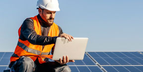 man working on a solar panels