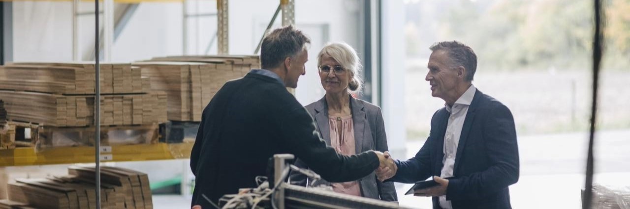 An image representing a group of people discussing about the pros and cons of extending credit