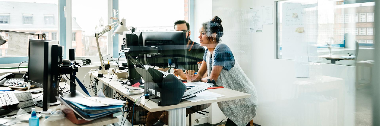 two-people-checking-computers