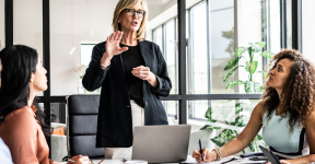 three businesswomen at the conference room in a meeting