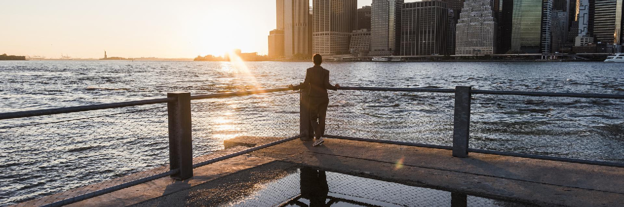 person-standing-in-front-of-sea-hero