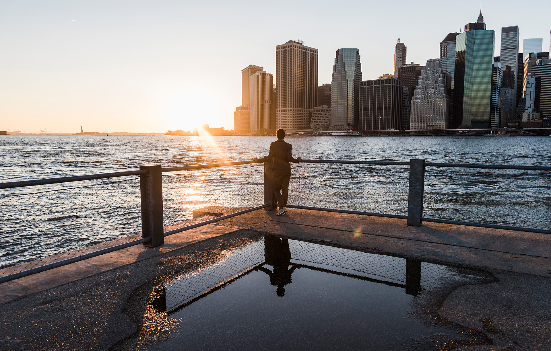 man looking out into sunset