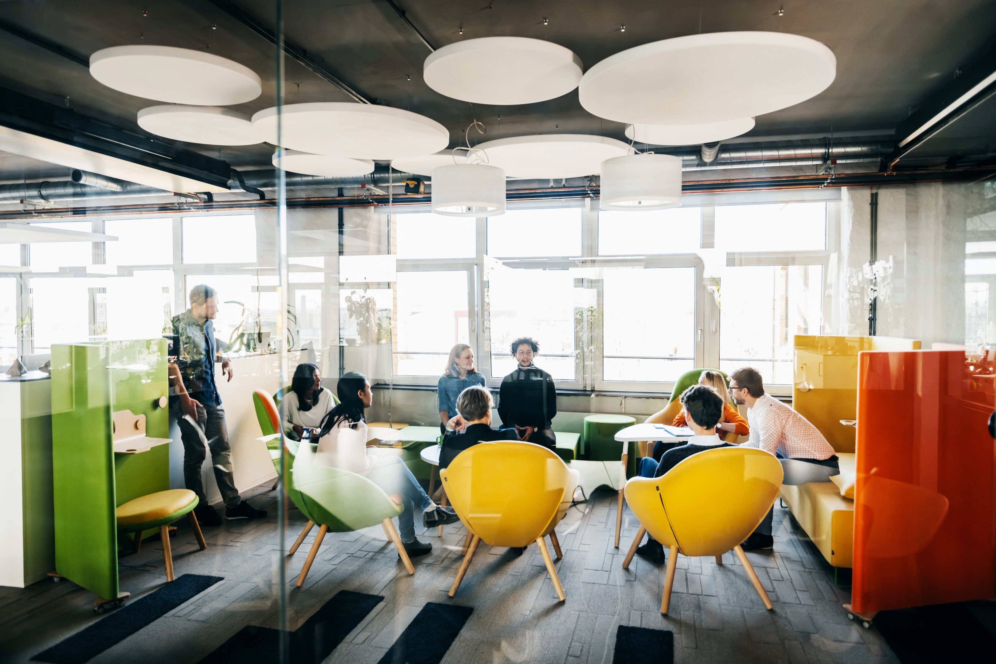 colleagues sitting around in office