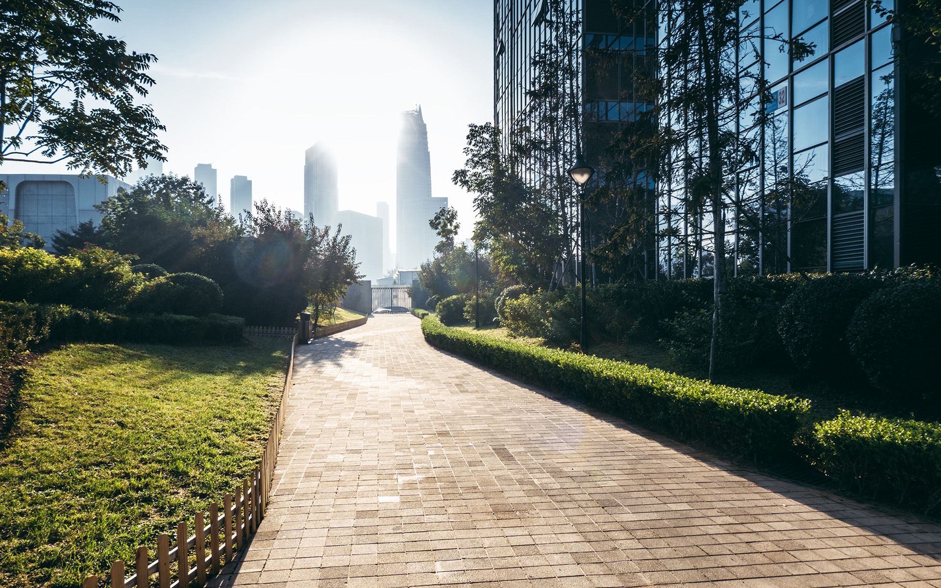 side walk with city in background