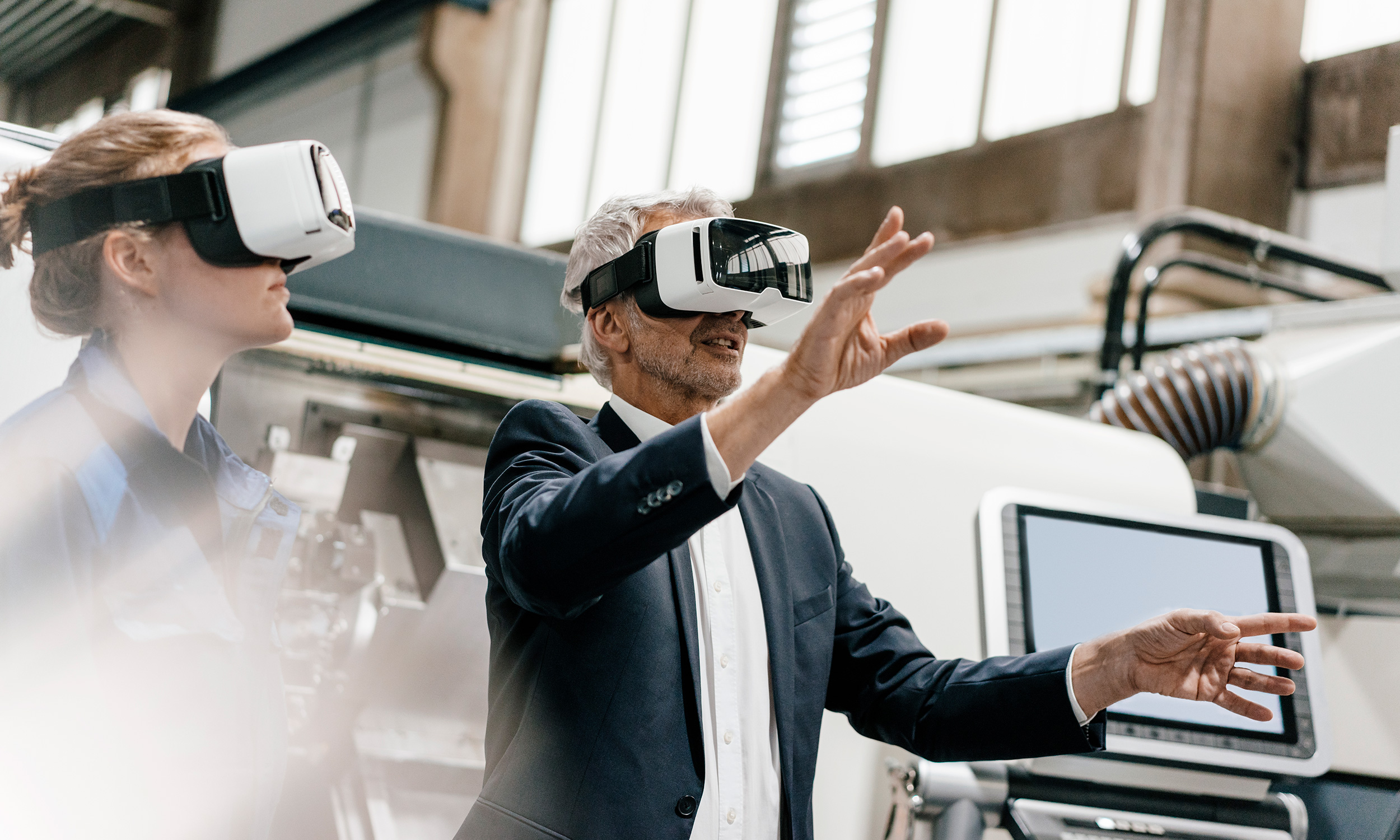 two people with VR headsets on