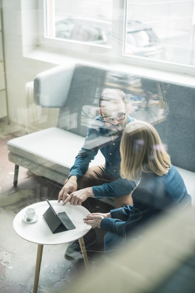 Image: People discussing on a coach