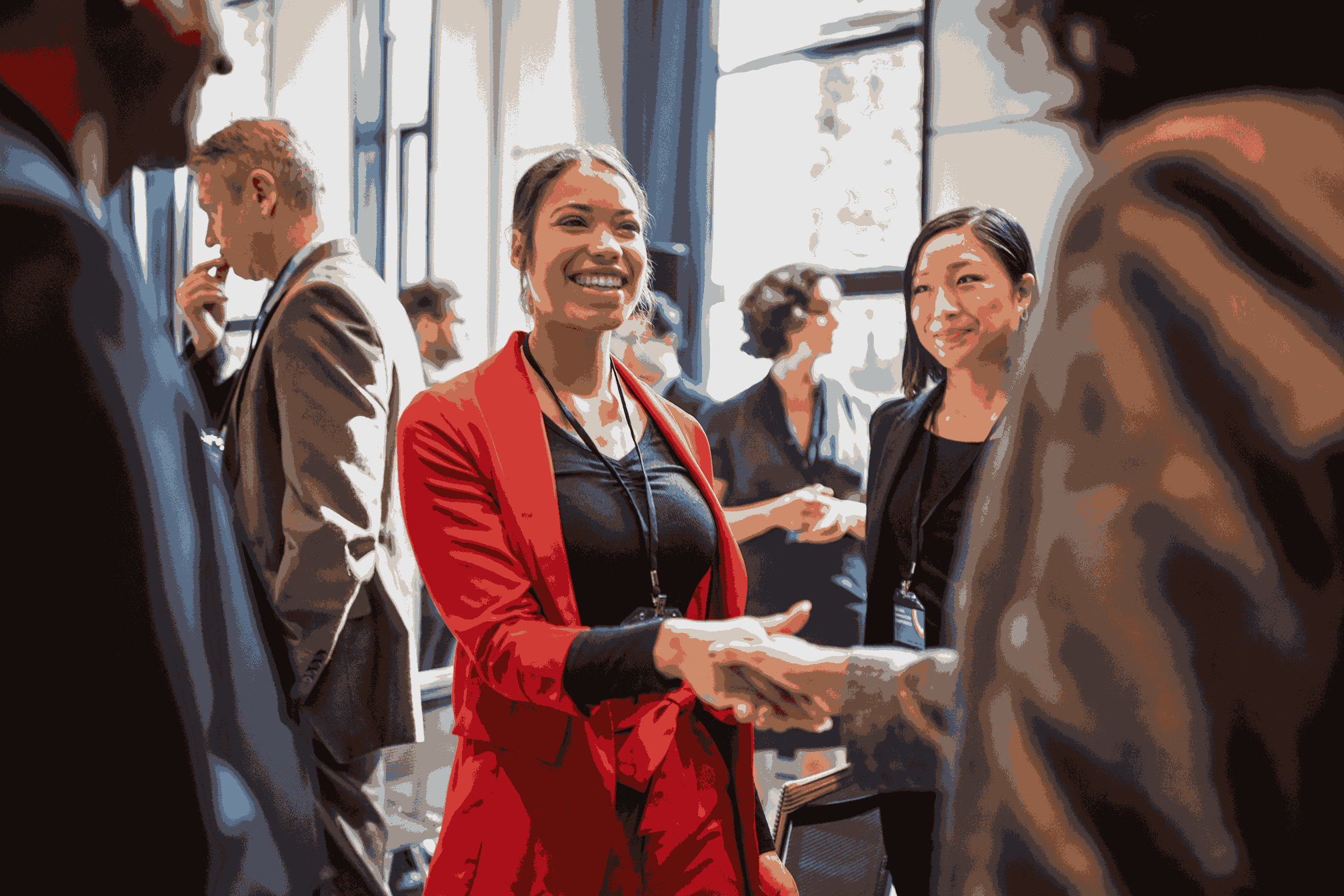 professional handshaking at an event