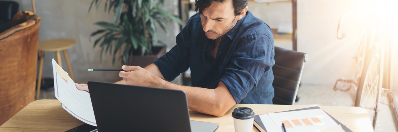 risk-underwriter-desk-working