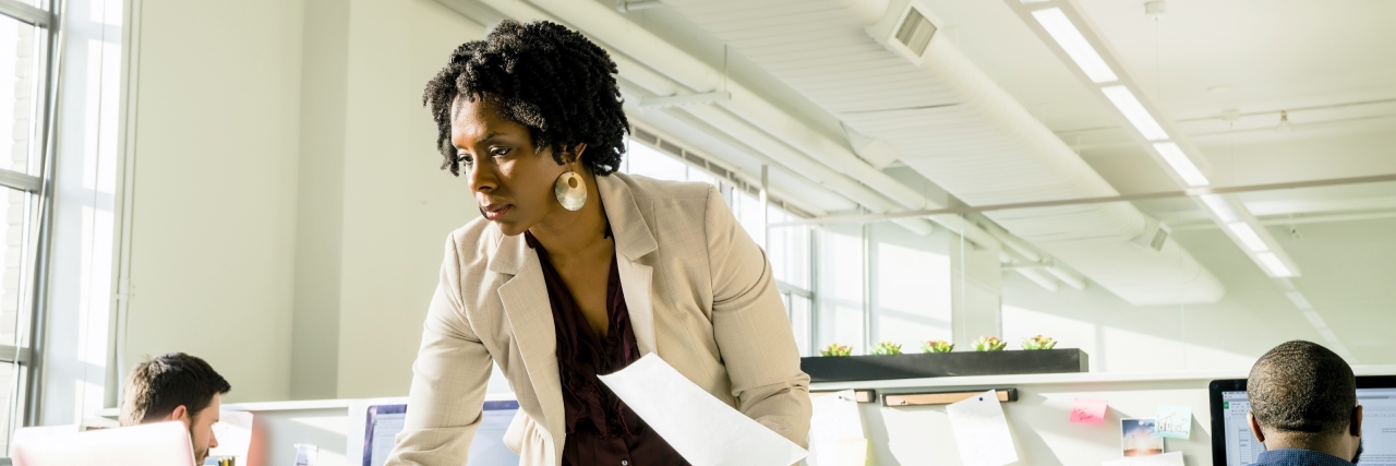 An image of a woman researching about accounts-receivable-turnover-ratio