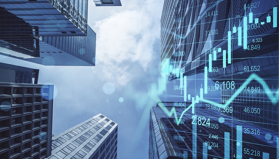 Krajobraz miasta z nałożoną niebieską grafiką giełdową