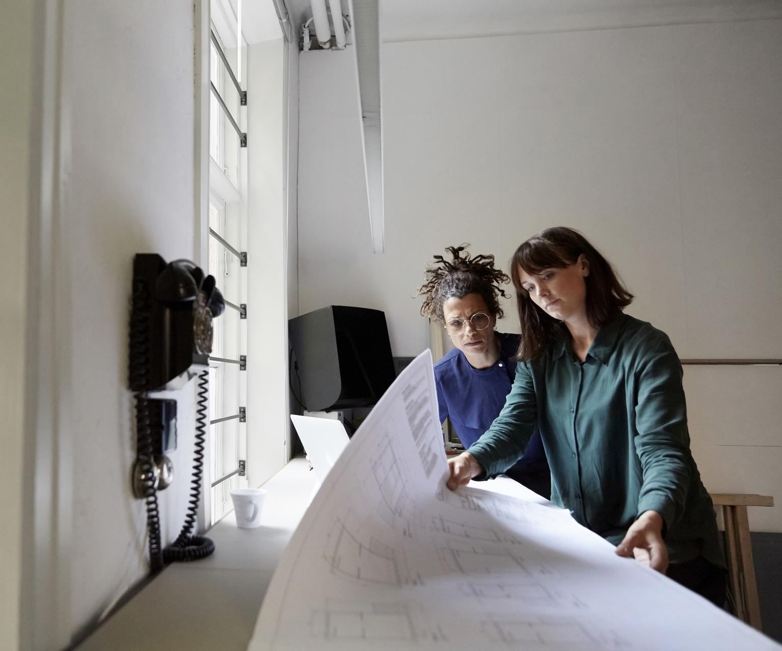 engineers-with-blueprints