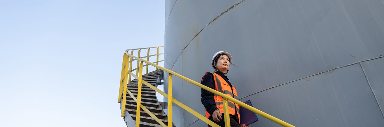 a female worker walking down the outdoor stairs